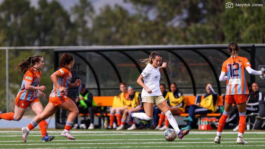 Burnaby player on ball