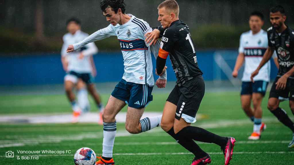 whitecaps player tackled by tss player