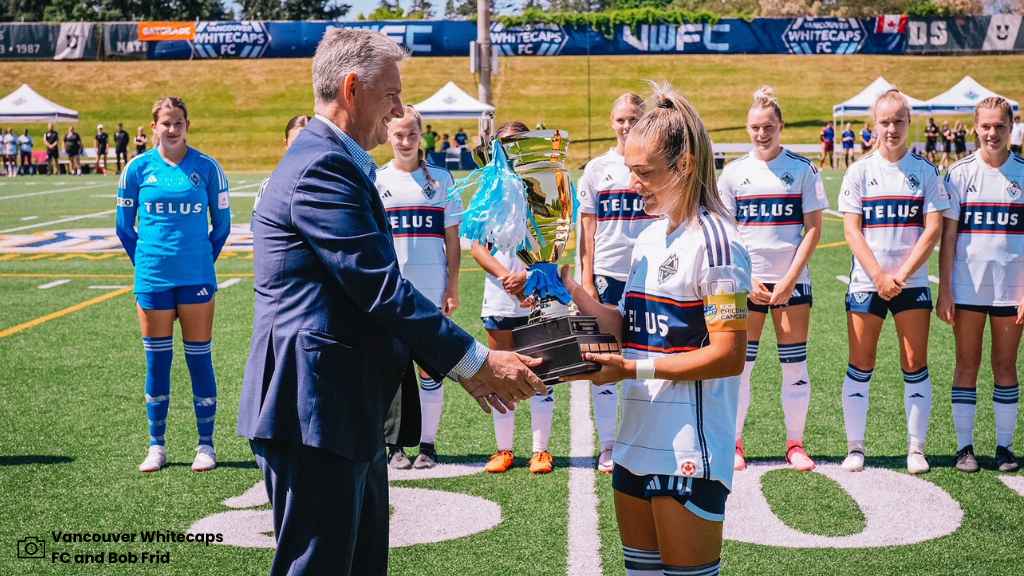 whitecaps fc captain receives trophy